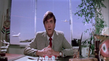 Checking Out (1988) download